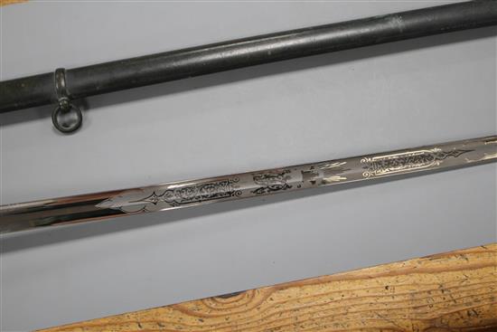 A Victorian infantry officers sword, the polished etched blade by J.B. Johnstone, gilt hilt and brass scabbard, blade 84cm, overall le